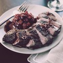 Black Pepper Crusted Duck Breast with Cherry Reduction Sauce